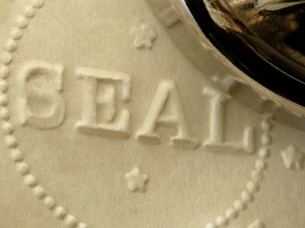 close up of embossed seal on paper